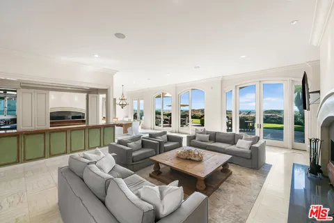 a view of a terrace with sitting area