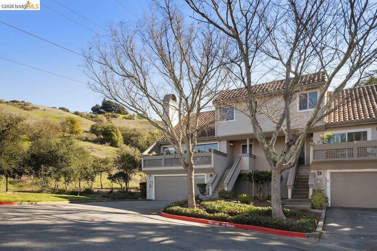 320 Corte Gabriel Moraga, CA 94556 - Photo 1 of 1 a front view of a house with a yard
