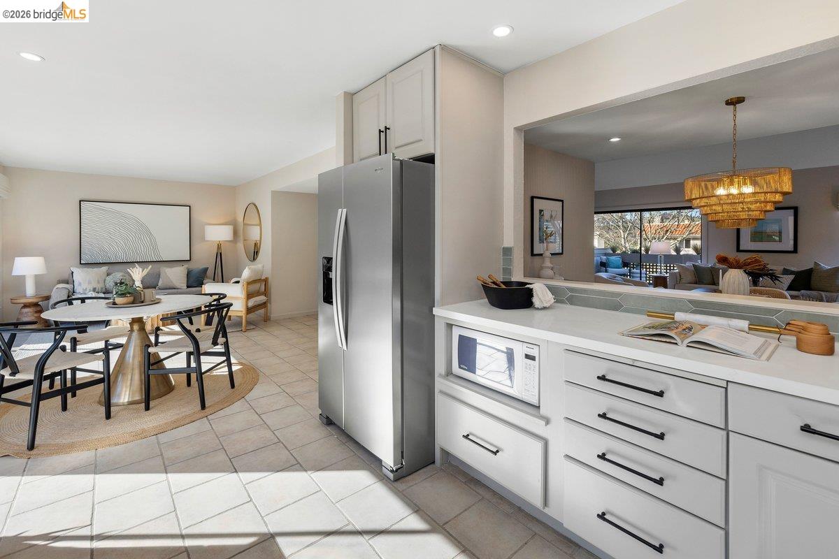 320 Corte Gabriel Moraga, CA 94556 - Photo 19 of 33 a kitchen with white cabinets and stainless steel appliances