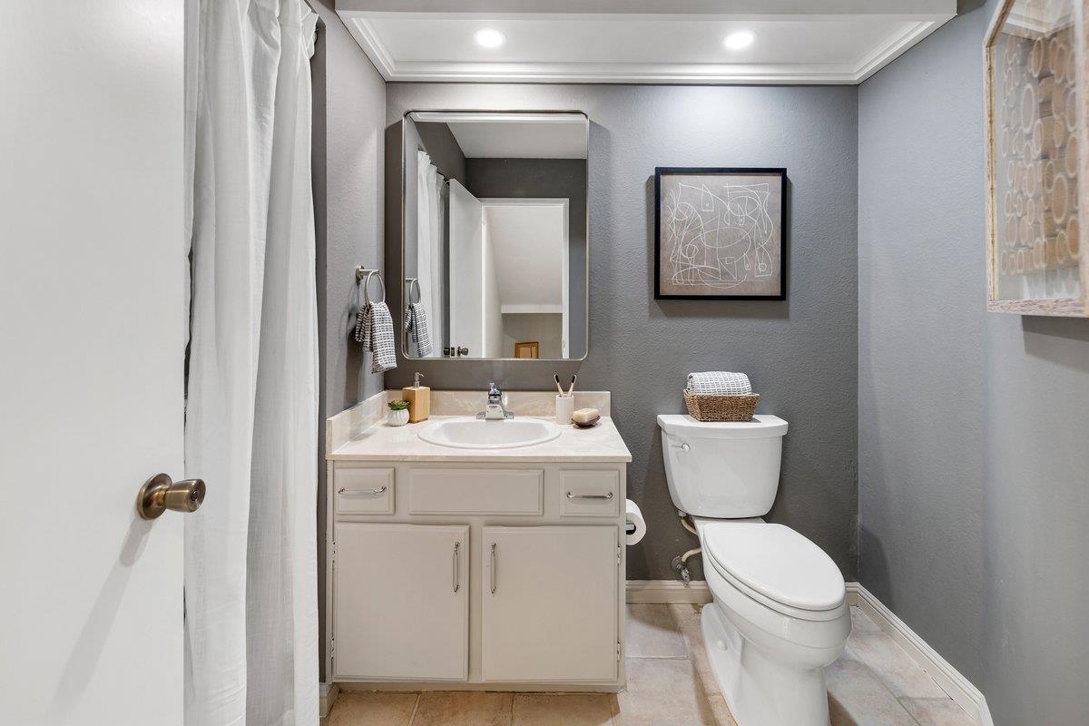 320 Corte Gabriel Moraga, CA 94556 - Photo 22 of 33 a white toilet sitting next to a bathroom sink