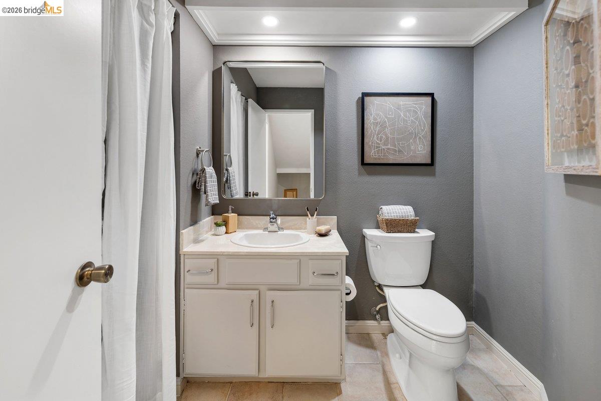 320 Corte Gabriel Moraga, CA 94556 - Photo 22 of 33 a white toilet sitting next to a bathroom sink