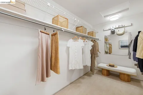 a bathroom with a tub and a view of bathroom