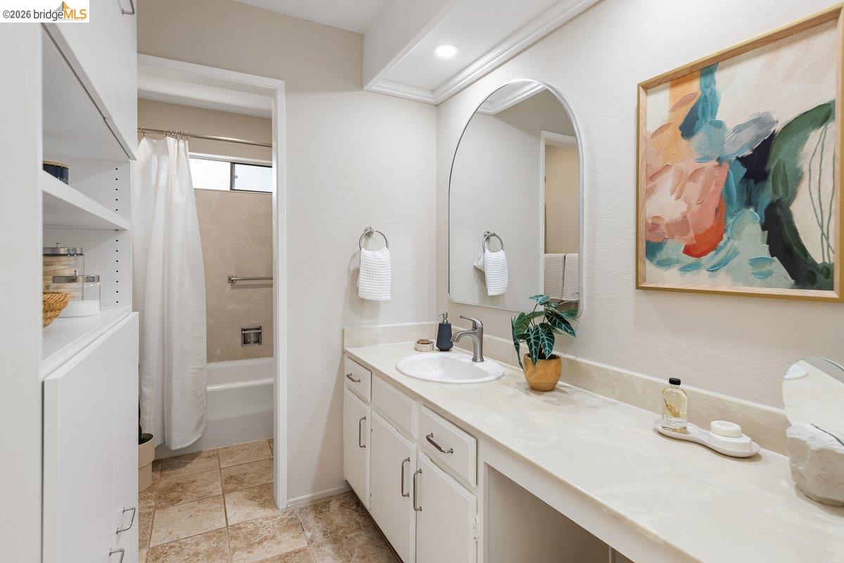 320 Corte Gabriel Moraga, CA 94556 - Photo 26 of 33 a bathroom with a double vanity sink and a mirror
