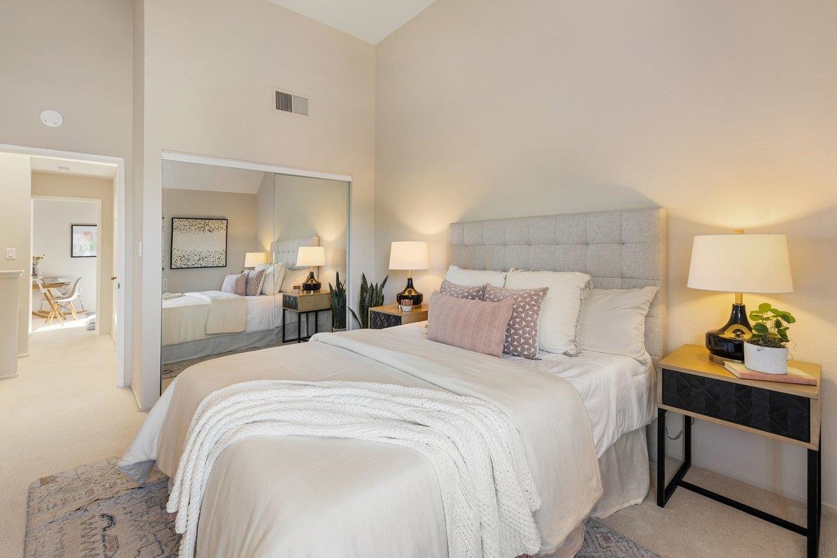 320 Corte Gabriel Moraga, CA 94556 - Photo 30 of 33 a bedroom with a bed and a lamp on dresser