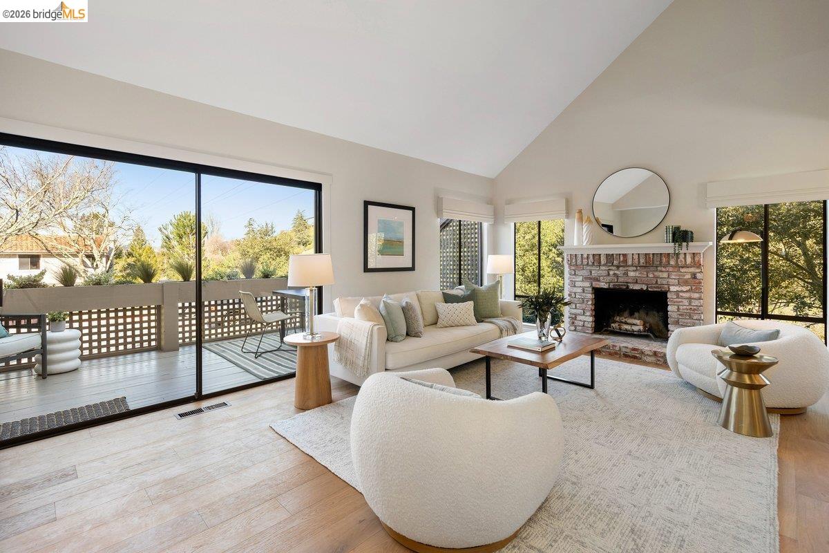 320 Corte Gabriel Moraga, CA 94556 - Photo 7 of 33 a living room with furniture large window and glass door