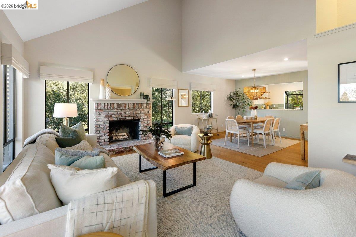 320 Corte Gabriel Moraga, CA 94556 - Photo 10 of 33 a living room with furniture couches and a fireplace