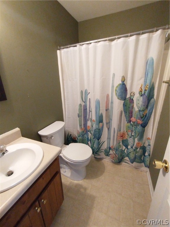 5929 Trinity Church Road Church Road, VA 23833 - Photo 16 of 26 a white toilet sitting next to a bathroom sink
