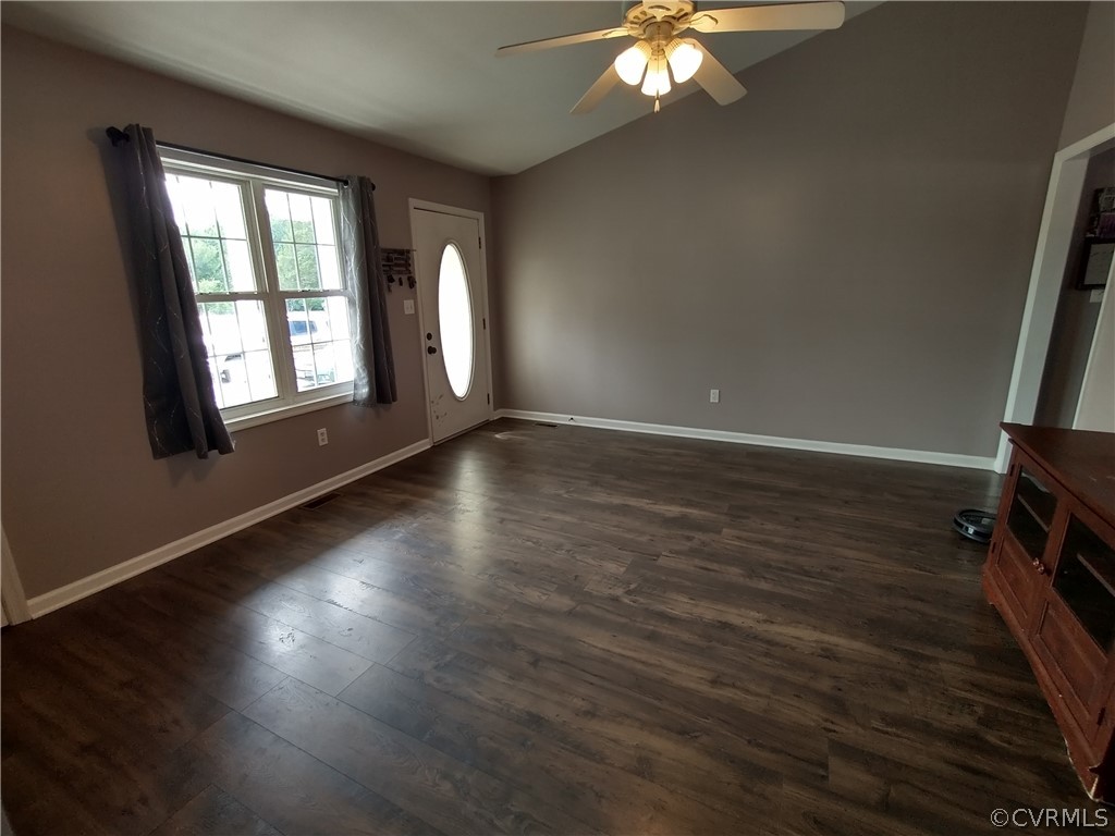 5929 Trinity Church Road Church Road, VA 23833 - Photo 4 of 26 an empty room with wooden floor and windows