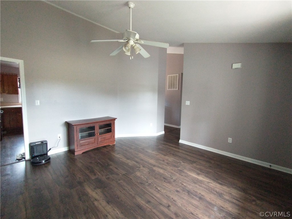 5929 Trinity Church Road Church Road, VA 23833 - Photo 5 of 26 a view of a livingroom with hardwood floor and a ceiling fan