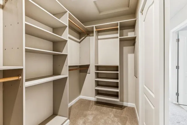 a view of a hallway with washer and dryer