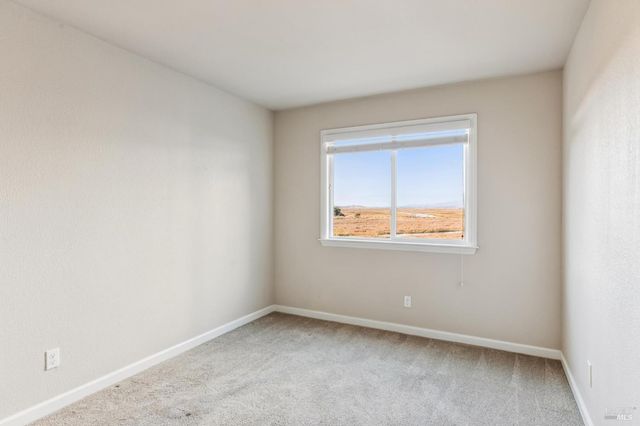 a view of a room with furniture