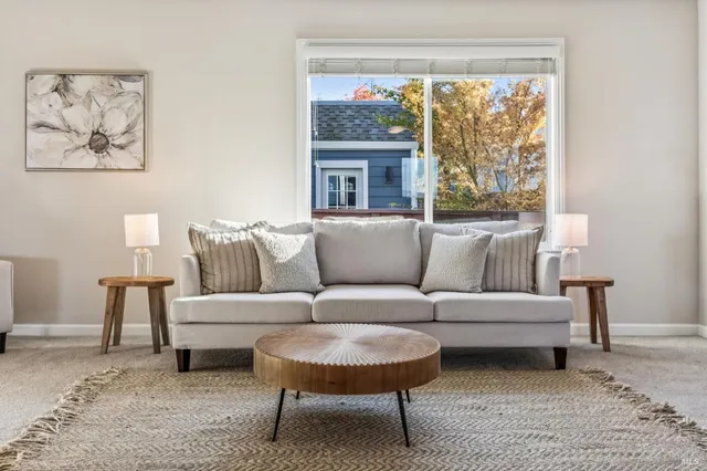 a kitchen with granite countertop a stove sink and cabinets