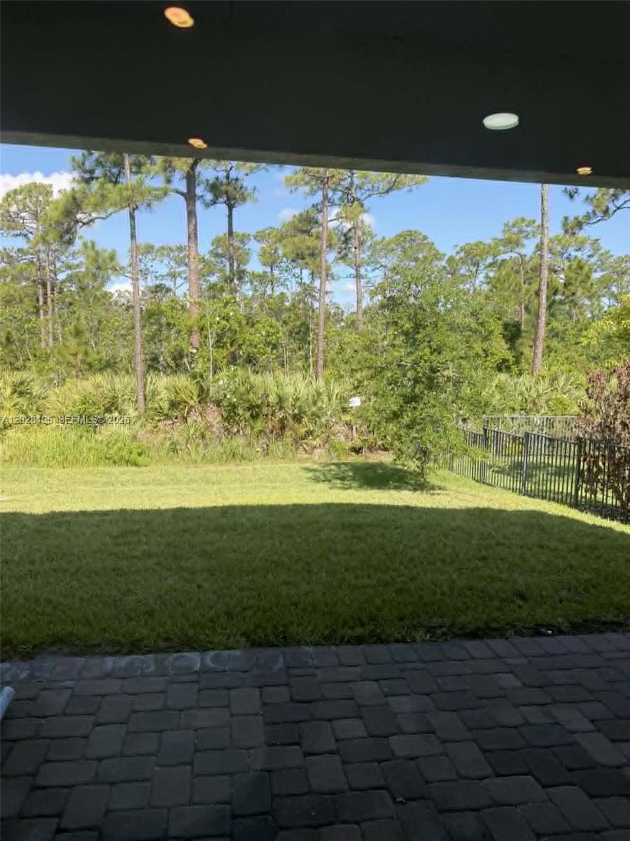 4710 Southwest Ardsley Drive Stuart, FL 34997 - Photo 7 of 7 a view of a yard