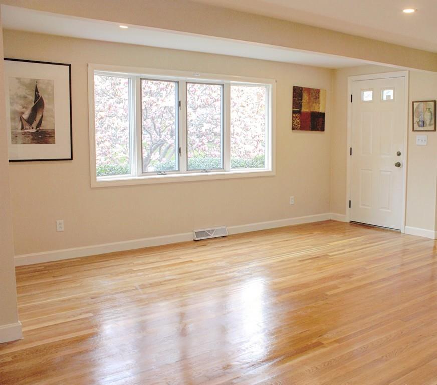 39 Kenneth Road Marblehead, MA 01945 - Photo 8 of 27 a view of an empty room with wooden floor and a window