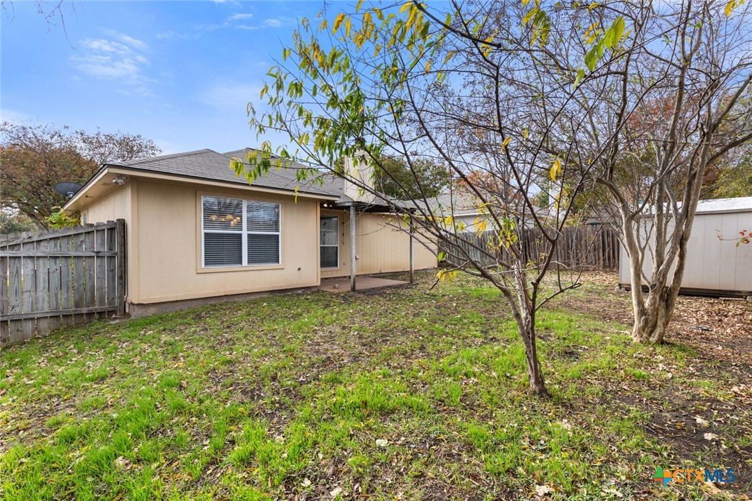 808 Silver Stone Drive Temple, TX 76502 - Photo 30 of 31 a house with trees in front of it