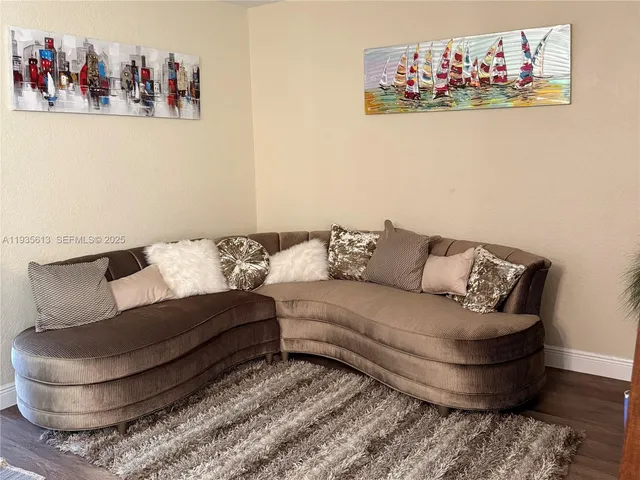 a living room with furniture and a couch