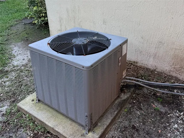 a sink view with a utility room