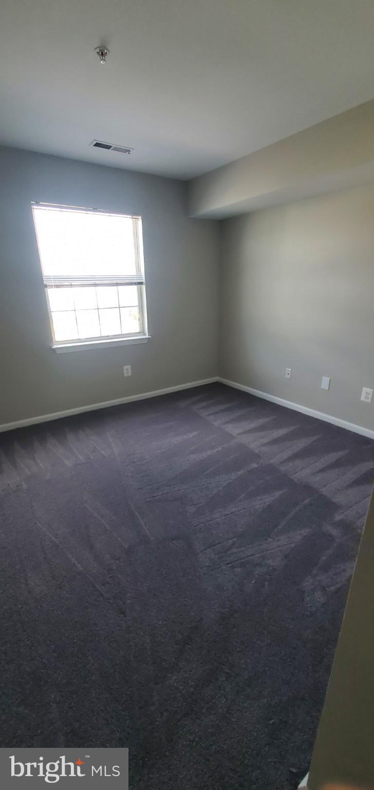 8343 Montgomery Run Road Ellicott City, MD 21043 - Photo 11 of 27 Spacious room with natural light.