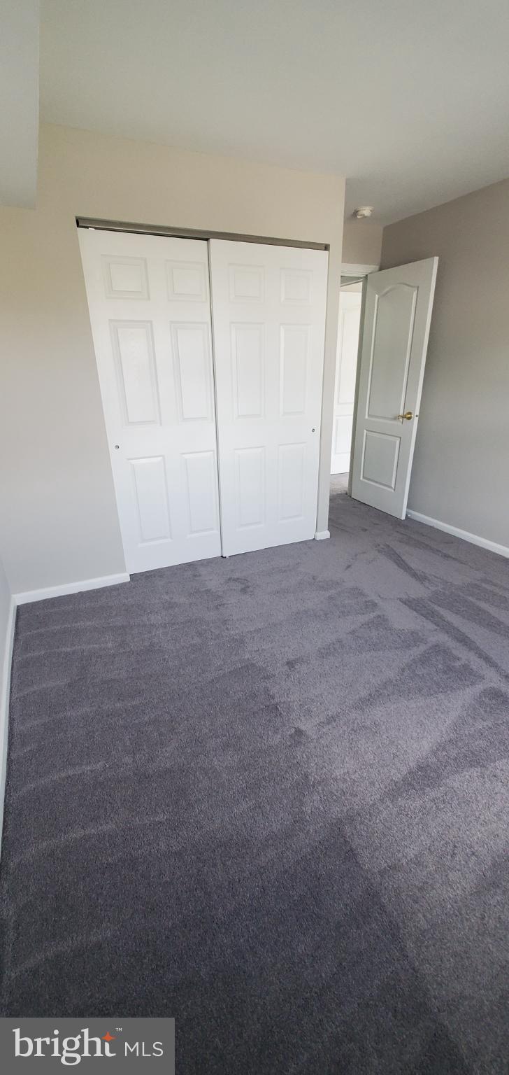 8343 Montgomery Run Road Ellicott City, MD 21043 - Photo 13 of 27 Spacious room with inviting natural light.