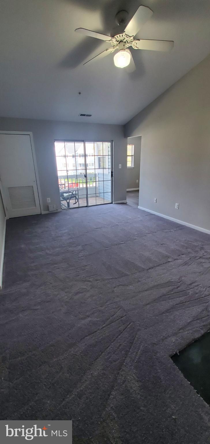 8343 Montgomery Run Road Ellicott City, MD 21043 - Photo 15 of 27 Spacious room with natural light and charm.