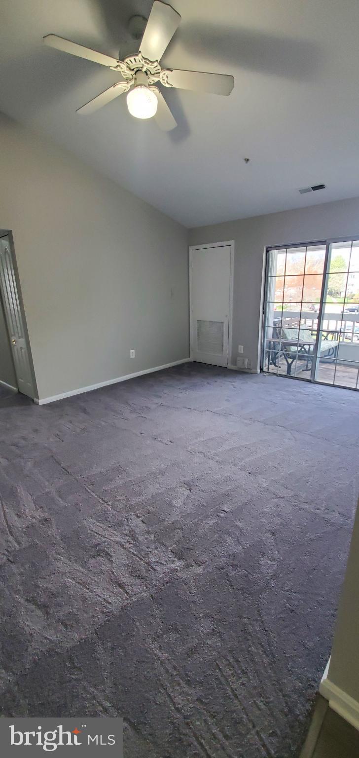 8343 Montgomery Run Road Ellicott City, MD 21043 - Photo 18 of 27 Spacious room with natural light and charm.