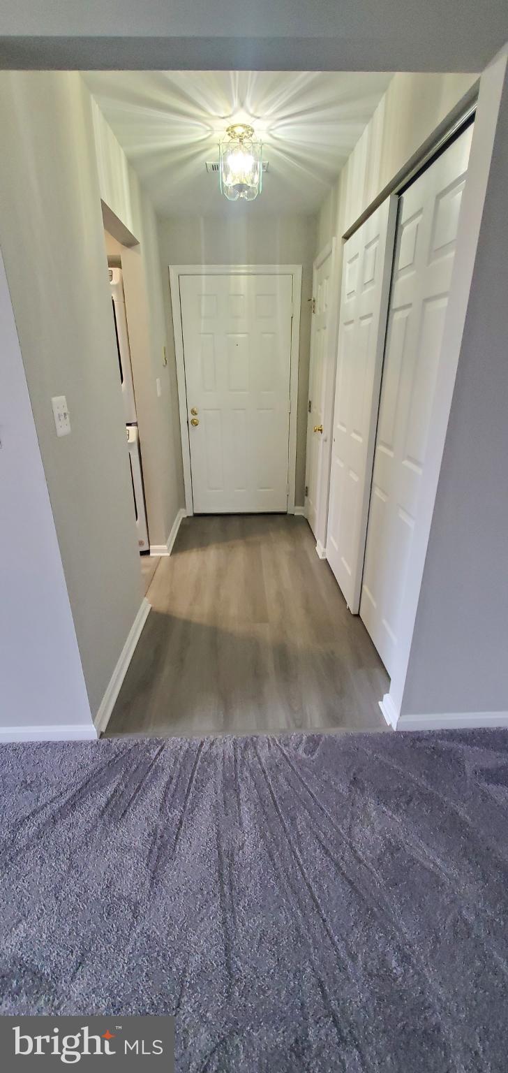 8343 Montgomery Run Road Ellicott City, MD 21043 - Photo 19 of 27 Inviting hallway with modern finishes.