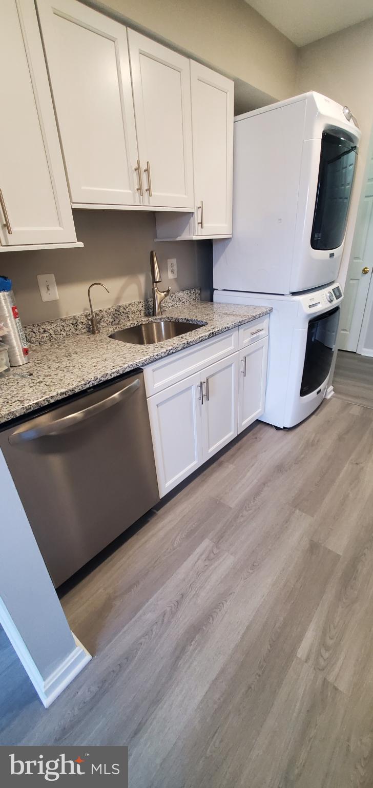 8343 Montgomery Run Road Ellicott City, MD 21043 - Photo 21 of 27 Modern kitchen with sleek appliances.