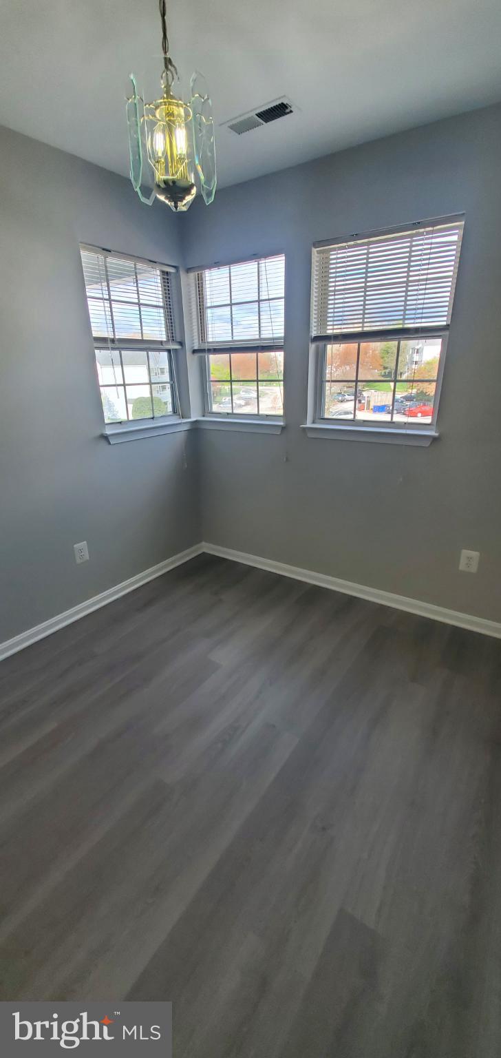 8343 Montgomery Run Road Ellicott City, MD 21043 - Photo 24 of 27 Bright and airy corner room with windows.