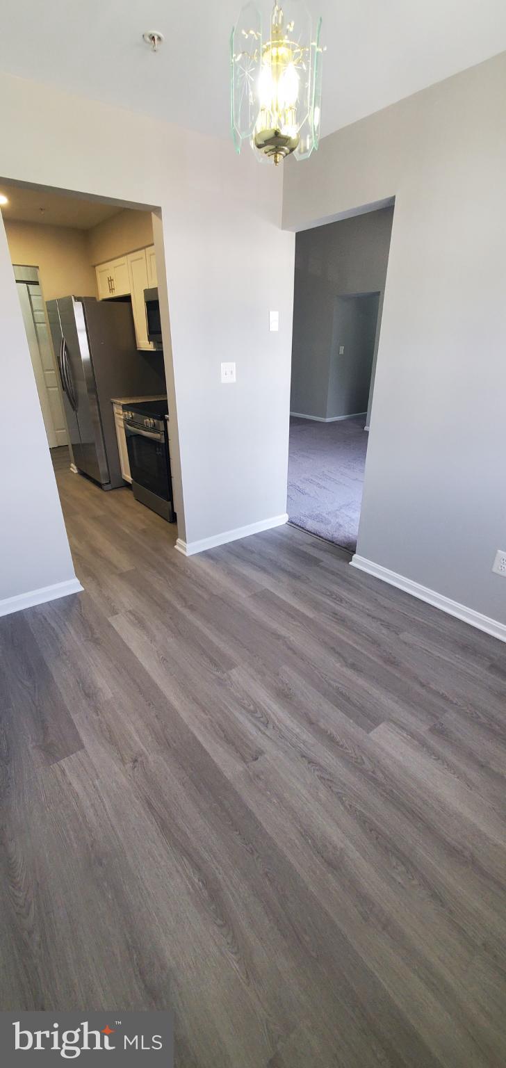 8343 Montgomery Run Road Ellicott City, MD 21043 - Photo 25 of 27 Modern entryway with sleek flooring.
