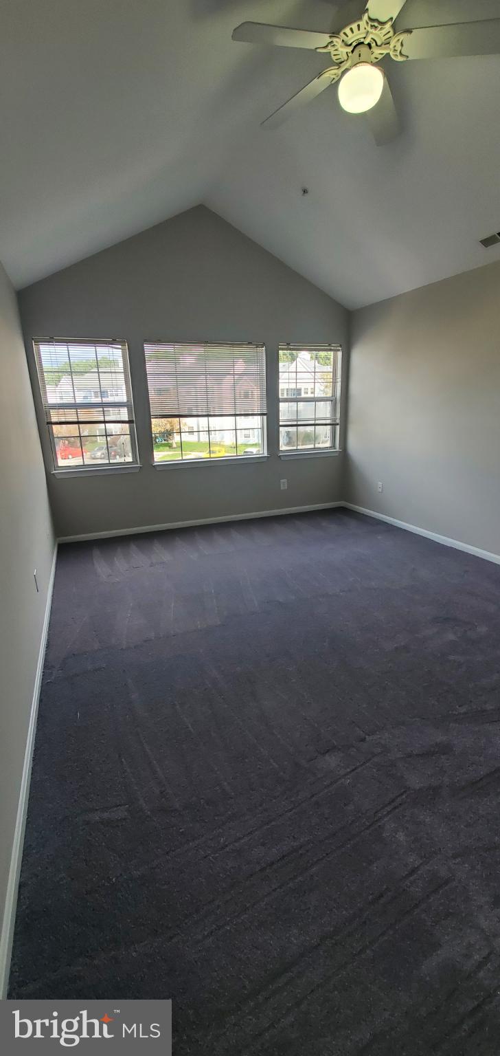 8343 Montgomery Run Road Ellicott City, MD 21043 - Photo 4 of 27 Bright and airy room with vaulted ceiling.
