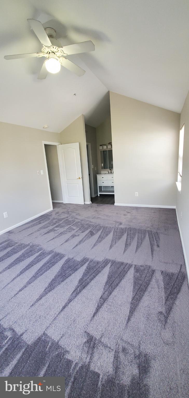 8343 Montgomery Run Road Ellicott City, MD 21043 - Photo 5 of 27 Spacious room with vaulted ceilings.