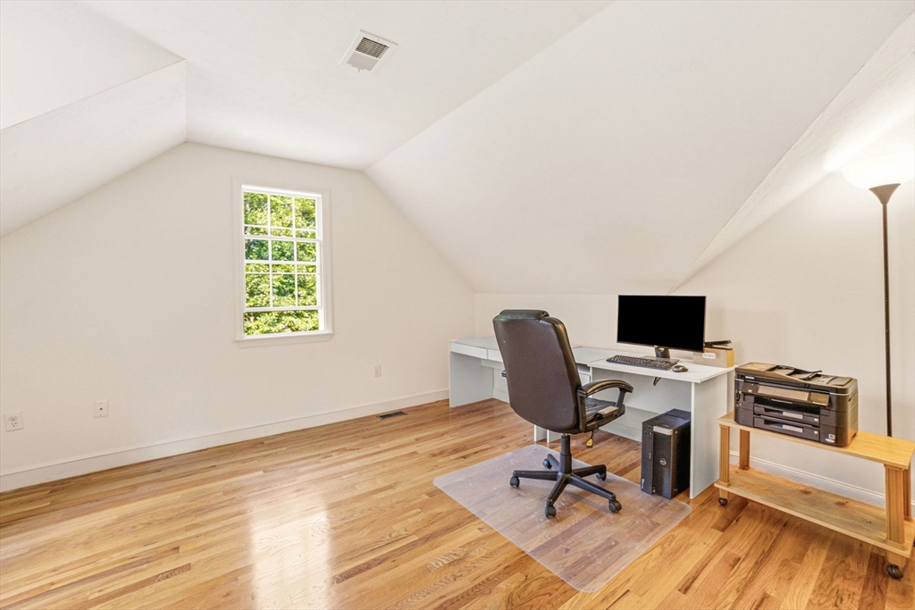 85 Cedarwood Road Boxborough, MA 01719 - Photo 29 of 41 a view of a workspace with furniture and a window