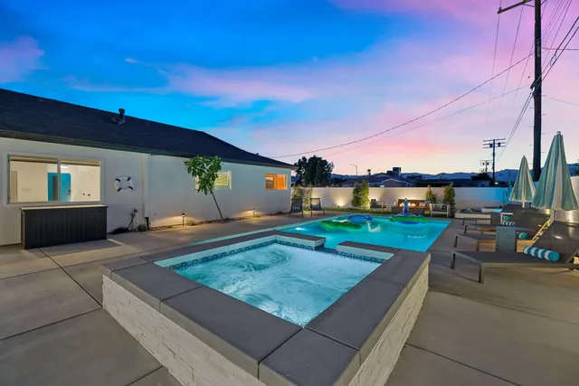 a view of a couches and tables in the patio