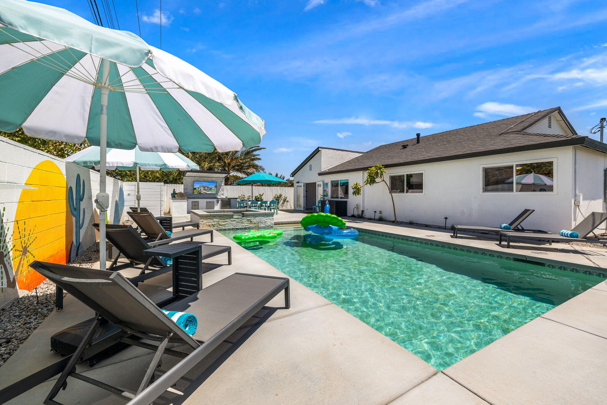 82156 Oleander Avenue Indio, CA 92201 - Photo 31 of 32 a view of a backyard with furniture and table