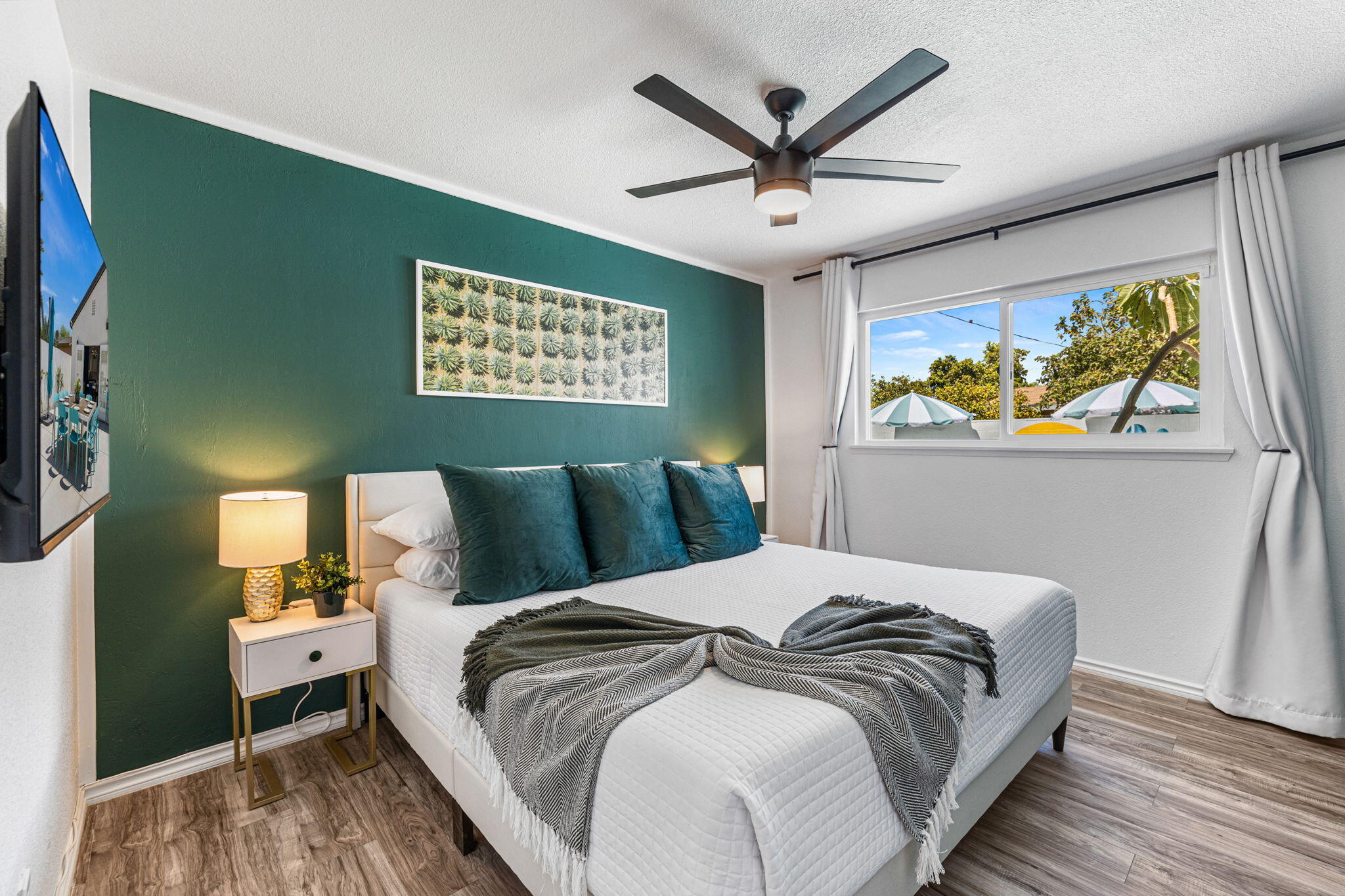 82156 Oleander Avenue Indio, CA 92201 - Photo 6 of 32 a bedroom with a large bed and a window