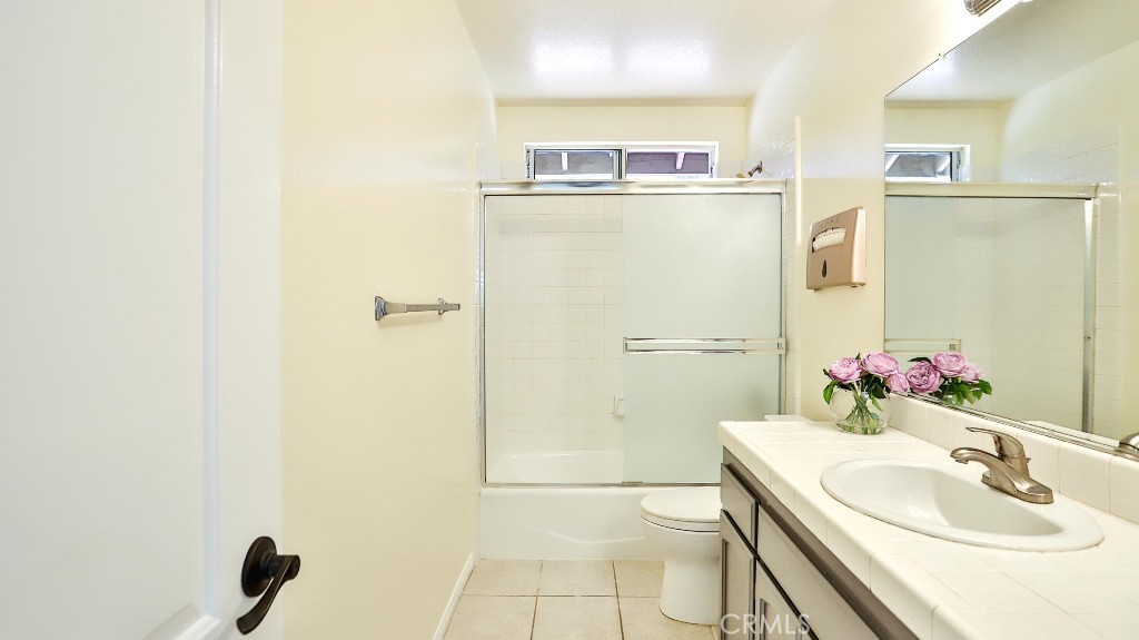 7855 Westpark Drive Riverside, CA 92506 - Photo 34 of 49 a bathroom with a sink and a mirror