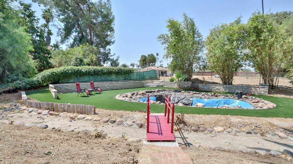 7855 Westpark Drive Riverside, CA 92506 - Photo 37 of 49 a view of a park with plants and a tree