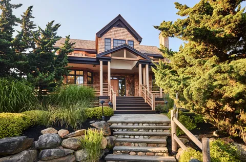front view of a house with a yard
