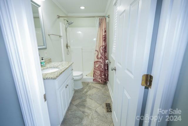 957 State Rd S-29-38 Lancaster, SC 29720 - Photo 17 of 25 a bathroom with a granite countertop sink a toilet and shower curtain