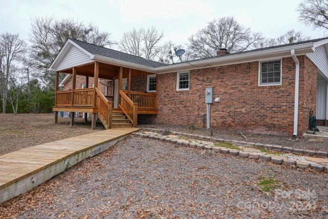 957 State Rd S-29-38 Lancaster, SC 29720 - Photo 4 of 25 a front view of a house with a yard