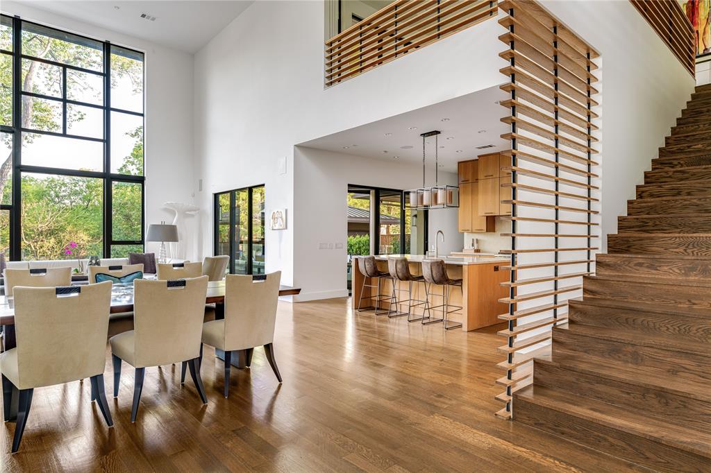11460 Strait Lane Dallas, TX 75229 - Photo 12 of 39 a view of a dining room with furniture window and wooden floor
