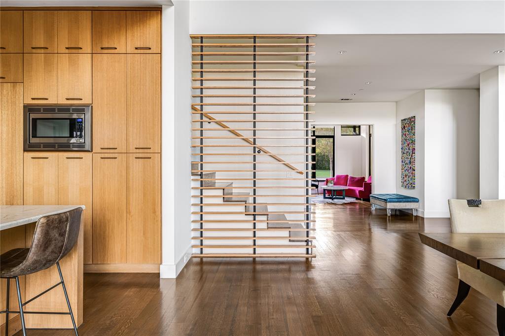 11460 Strait Lane Dallas, TX 75229 - Photo 16 of 39 a view of a living room with furniture and a flat screen tv