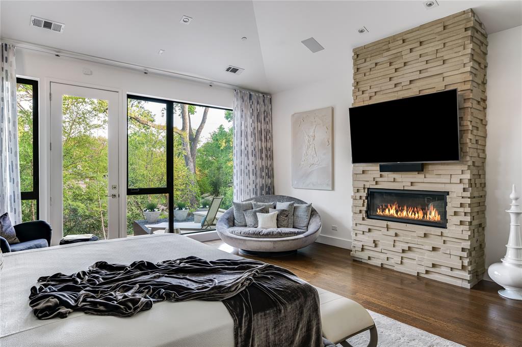 11460 Strait Lane Dallas, TX 75229 - Photo 20 of 39 a living room with furniture and a flat screen tv