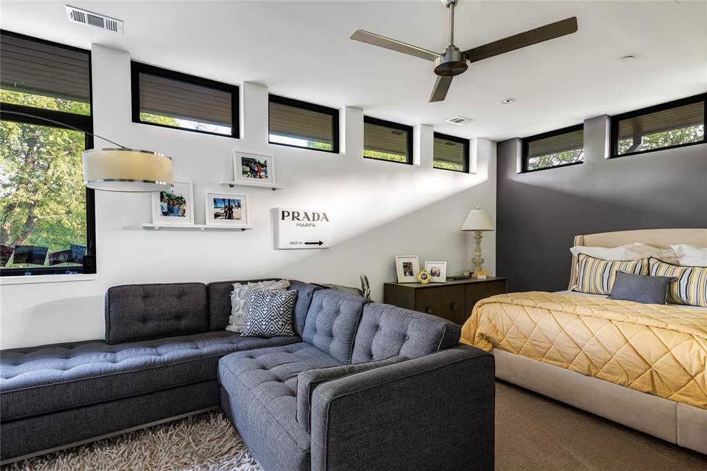 11460 Strait Lane Dallas, TX 75229 - Photo 28 of 39 a living room with couches and a flat screen tv