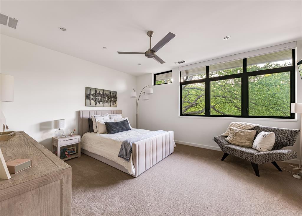 11460 Strait Lane Dallas, TX 75229 - Photo 29 of 39 a bedroom with two beds and a large window