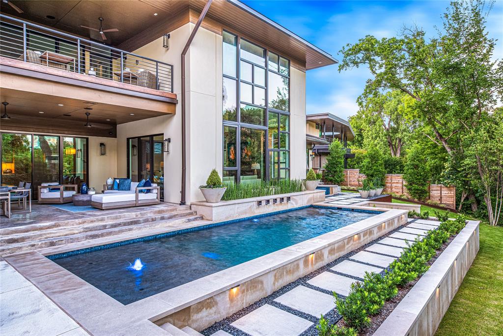 11460 Strait Lane Dallas, TX 75229 - Photo 32 of 39 a view of a house with a swimming pool and sitting area