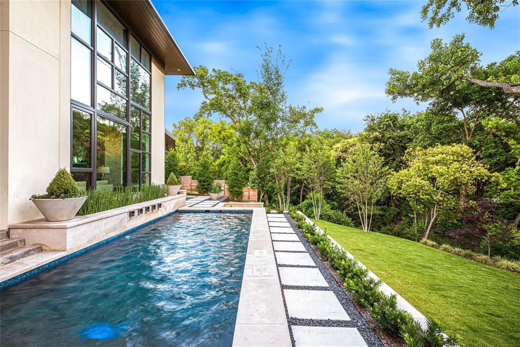 11460 Strait Lane Dallas, TX 75229 - Photo 34 of 39 a view of a garden with pathway