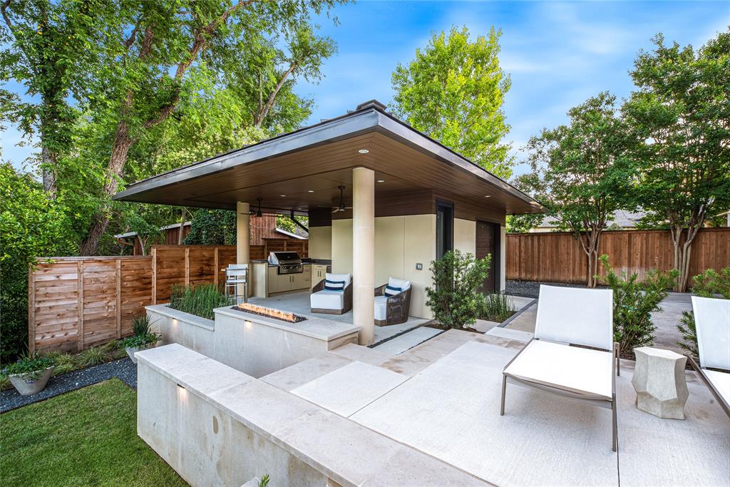 11460 Strait Lane Dallas, TX 75229 - Photo 37 of 39 a view of a patio with couches chairs potted plants and a palm tree