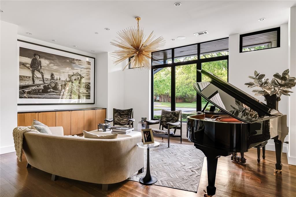 11460 Strait Lane Dallas, TX 75229 - Photo 4 of 39 a living room with furniture and a large window