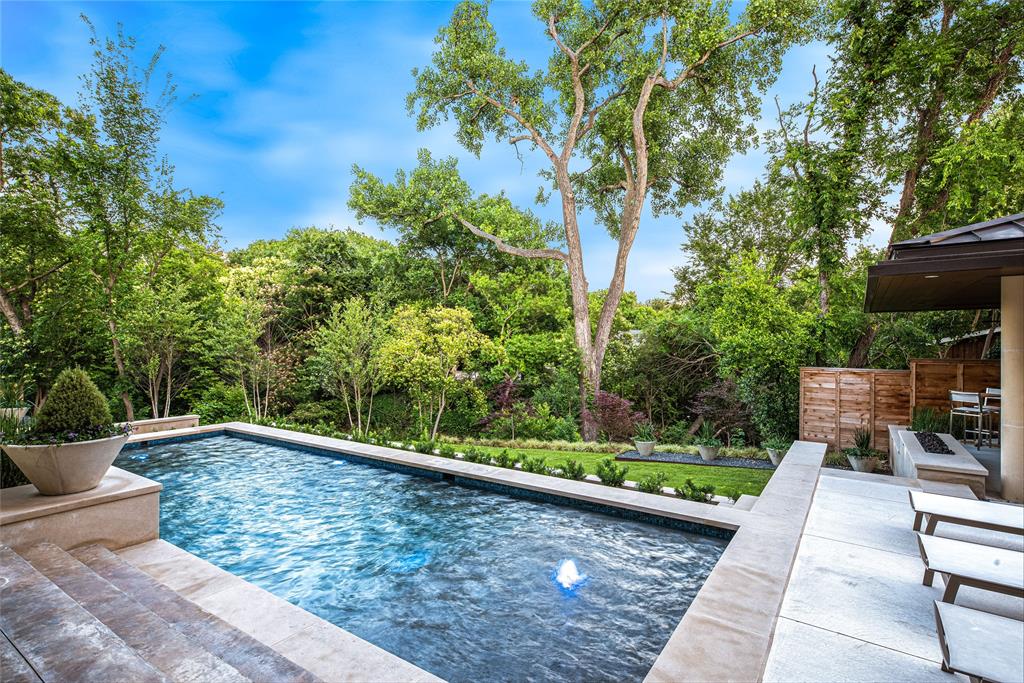 11460 Strait Lane Dallas, TX 75229 - Photo 5 of 39 a view of a patio with chair and table